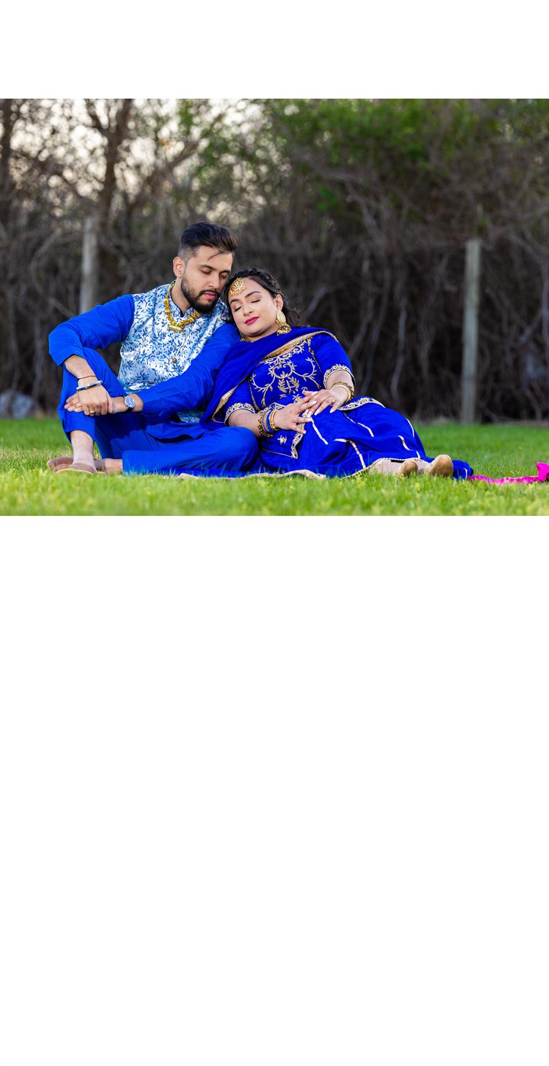 Couple sitting on grass